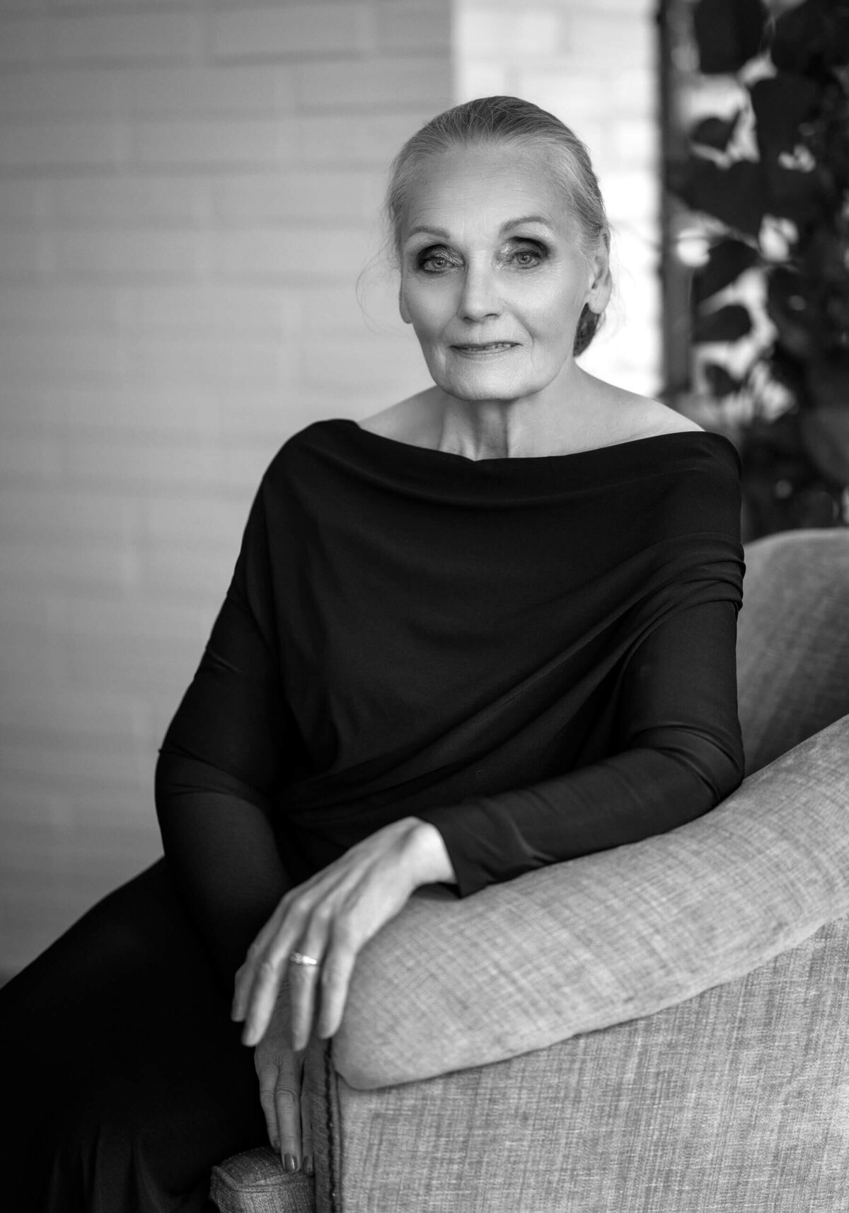 Timeless Beauty and Poise – A senior woman’s portrait embracing age with grace.