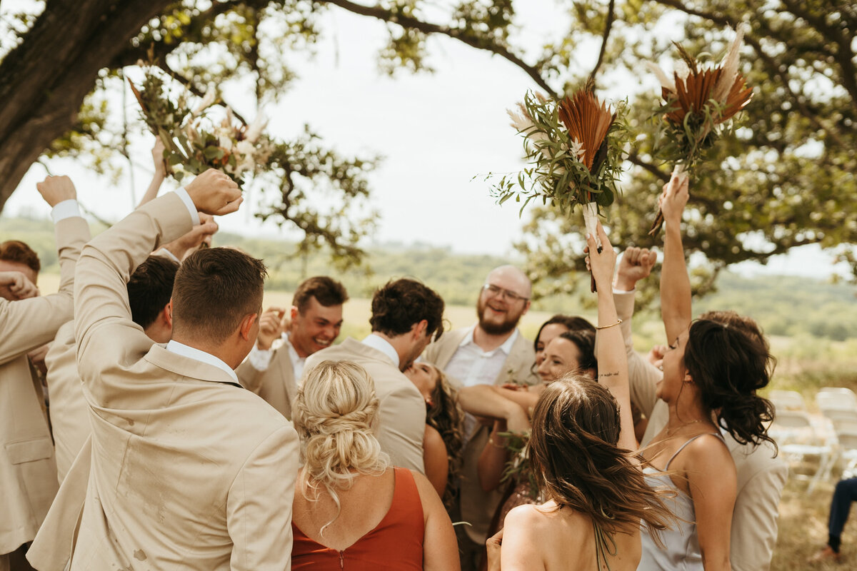 storyteller-collective-photo-co-outdoor-wedding-joyful-moment-iowa