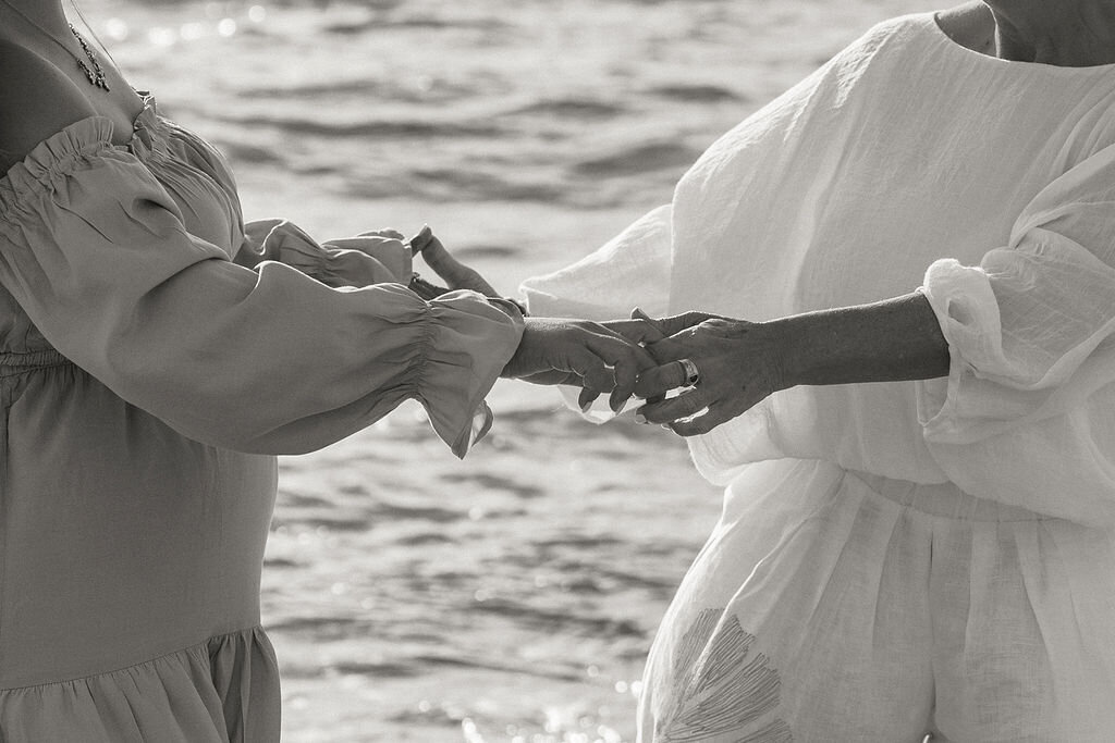 miami-maternity-holding-hands-generations-beach-bw