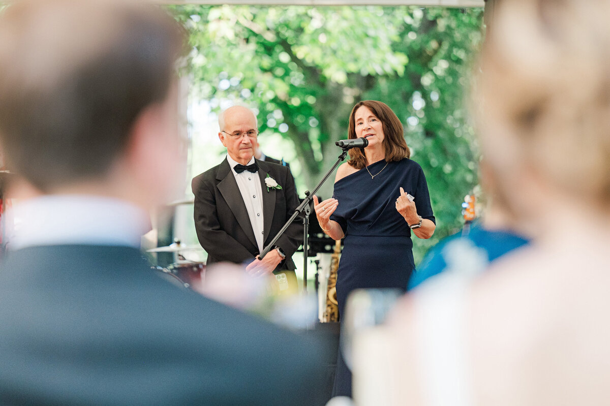 parents of the bride giving a wedding toast at the frick