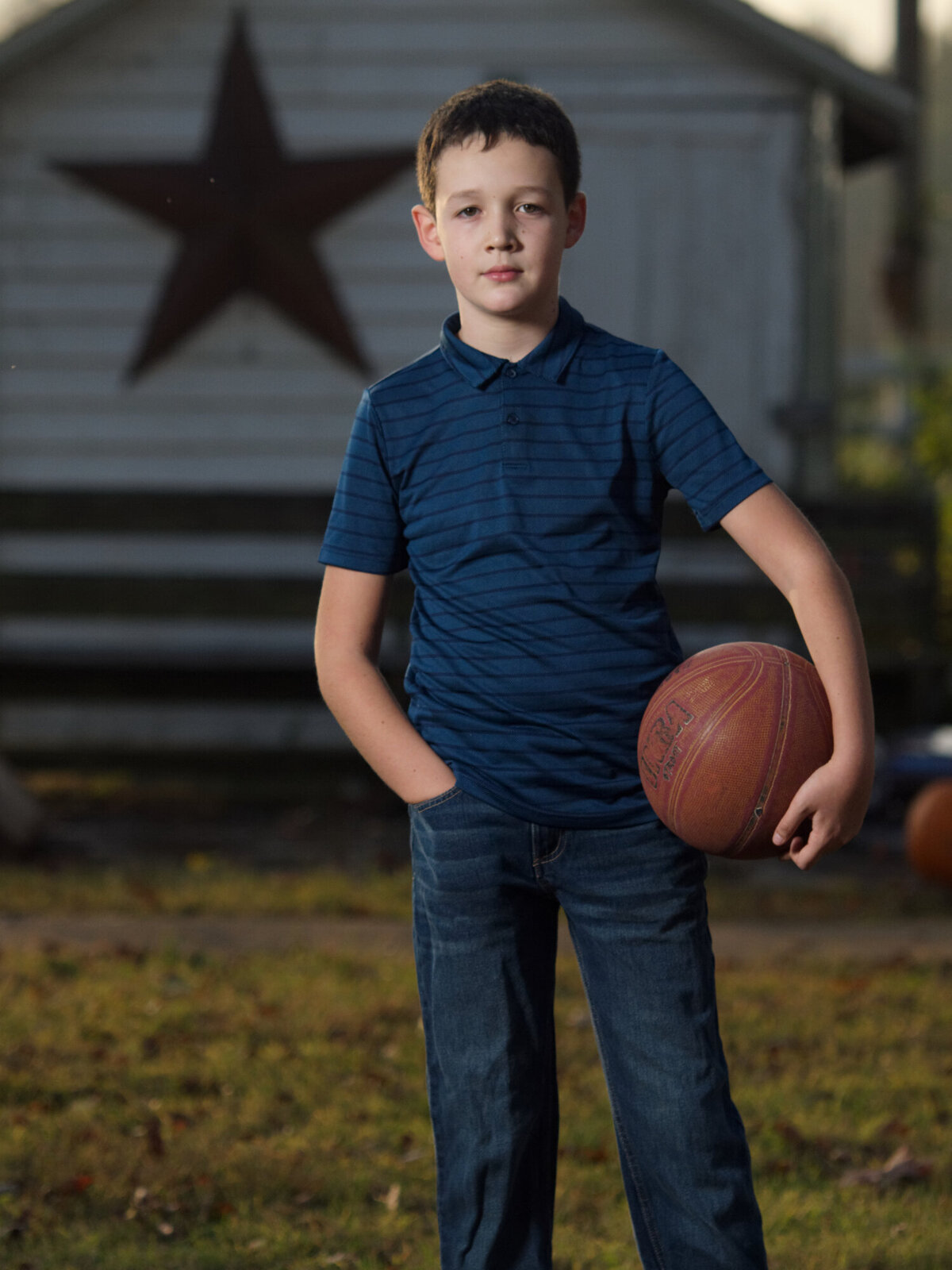 both holding basketball outdoor daytime portrait