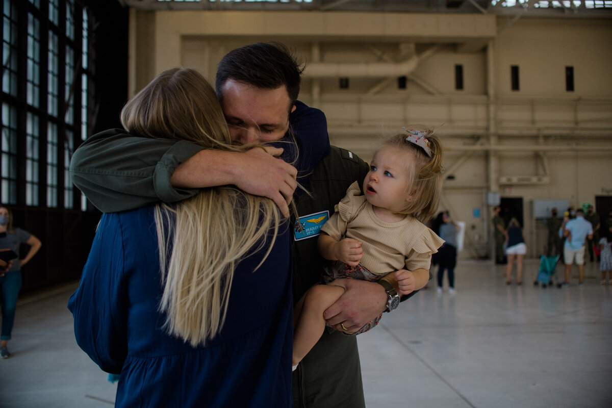 family_hug_navy_homecoming