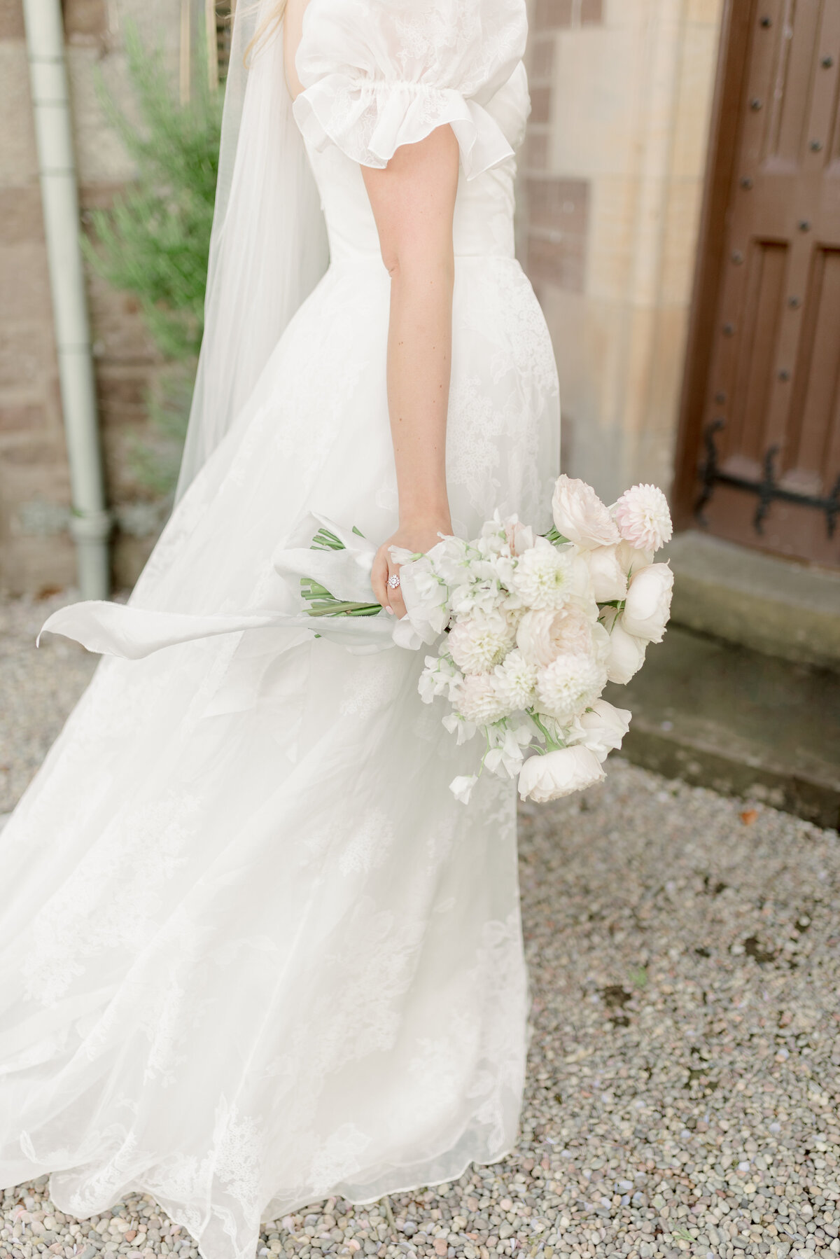 Peony wedding bouquet by Lavender and Rose Events and patterned silk wedding dress, worn by Bride at Cromlix House, Scotland, photographed by fine art wedding photographer UK.