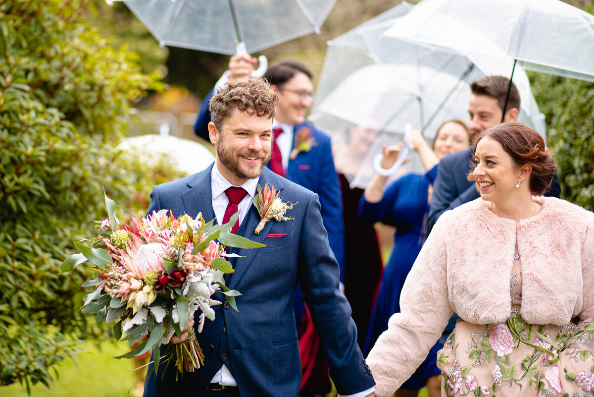 Rainy weather wedding photos in the Ottways