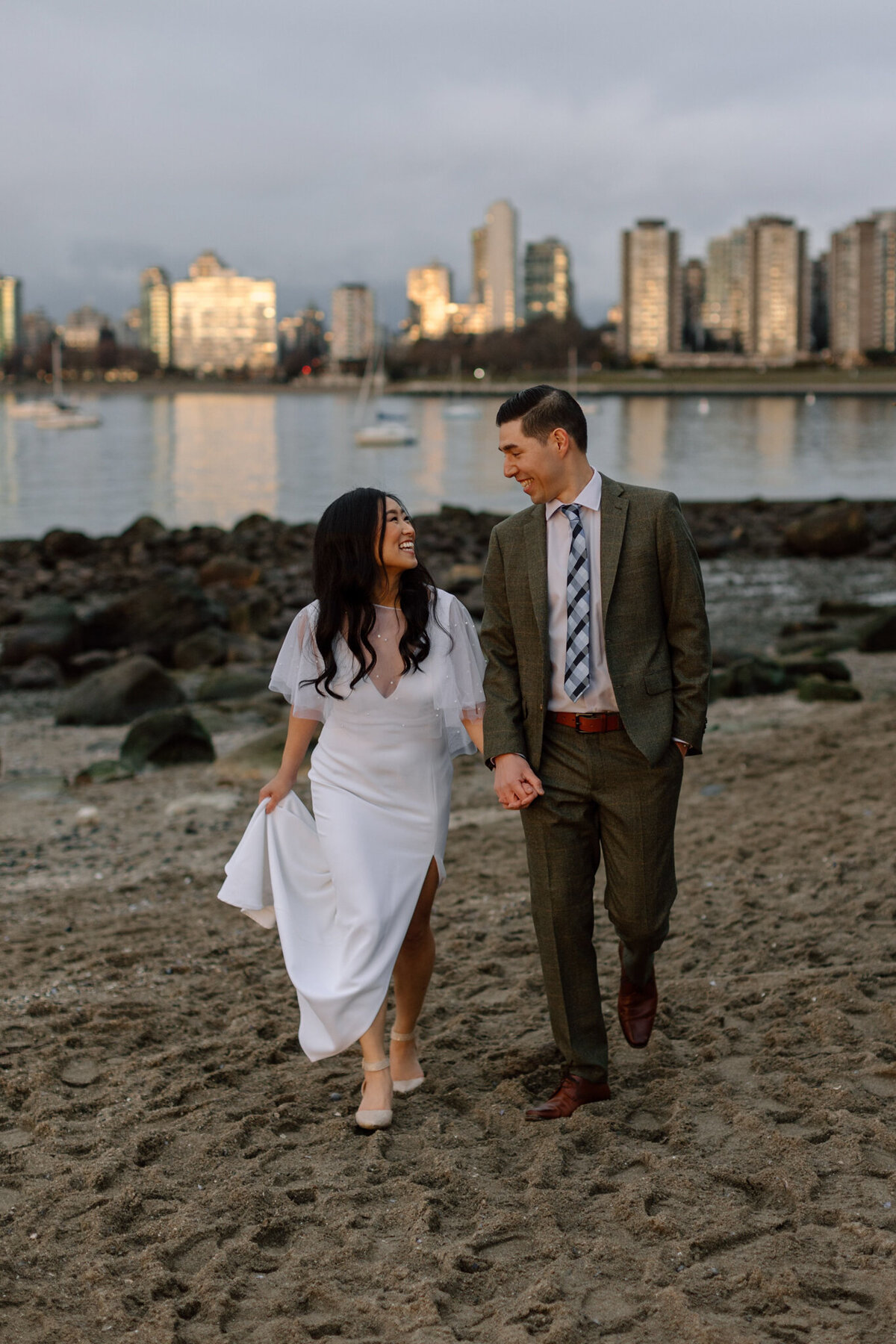 Stunning bride and groom on beach, capture by Bronte Taylor Photography, is a Vancouver based photographer with a playful, genuine and intimate approach.