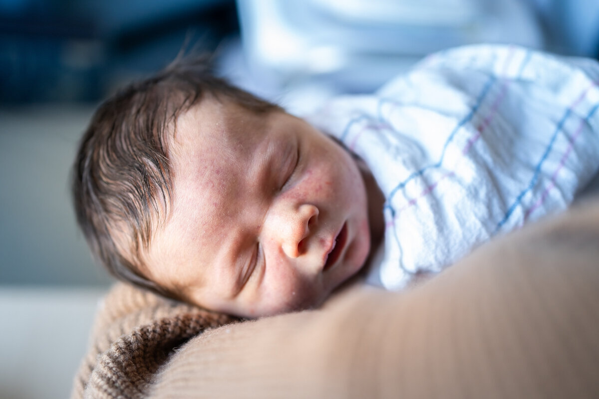 Sleeping newborn baby boy