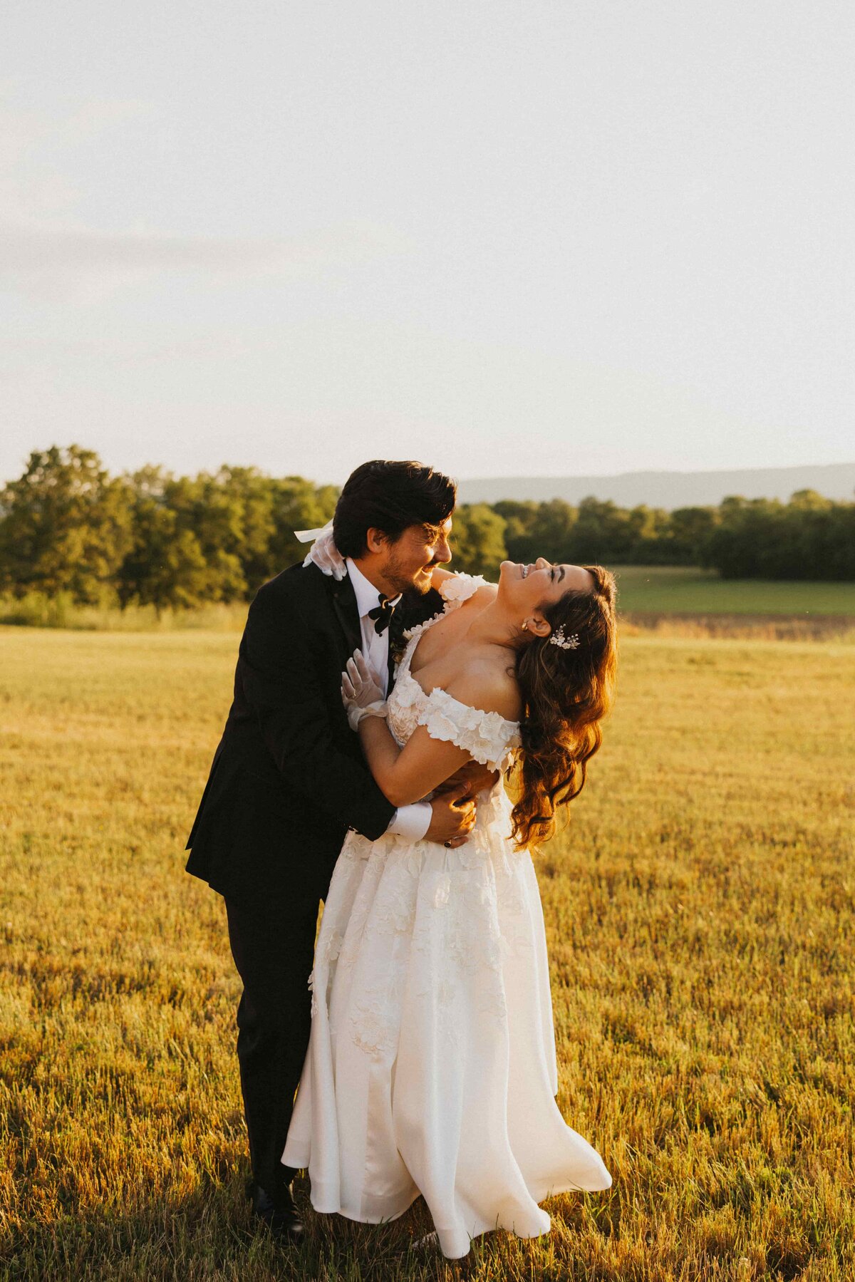 bride and groom embrace