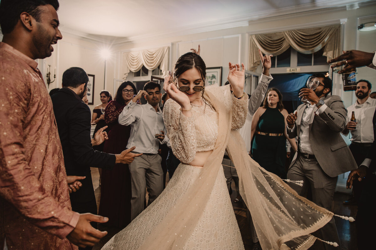 A person dancing during their wedding ceremony 