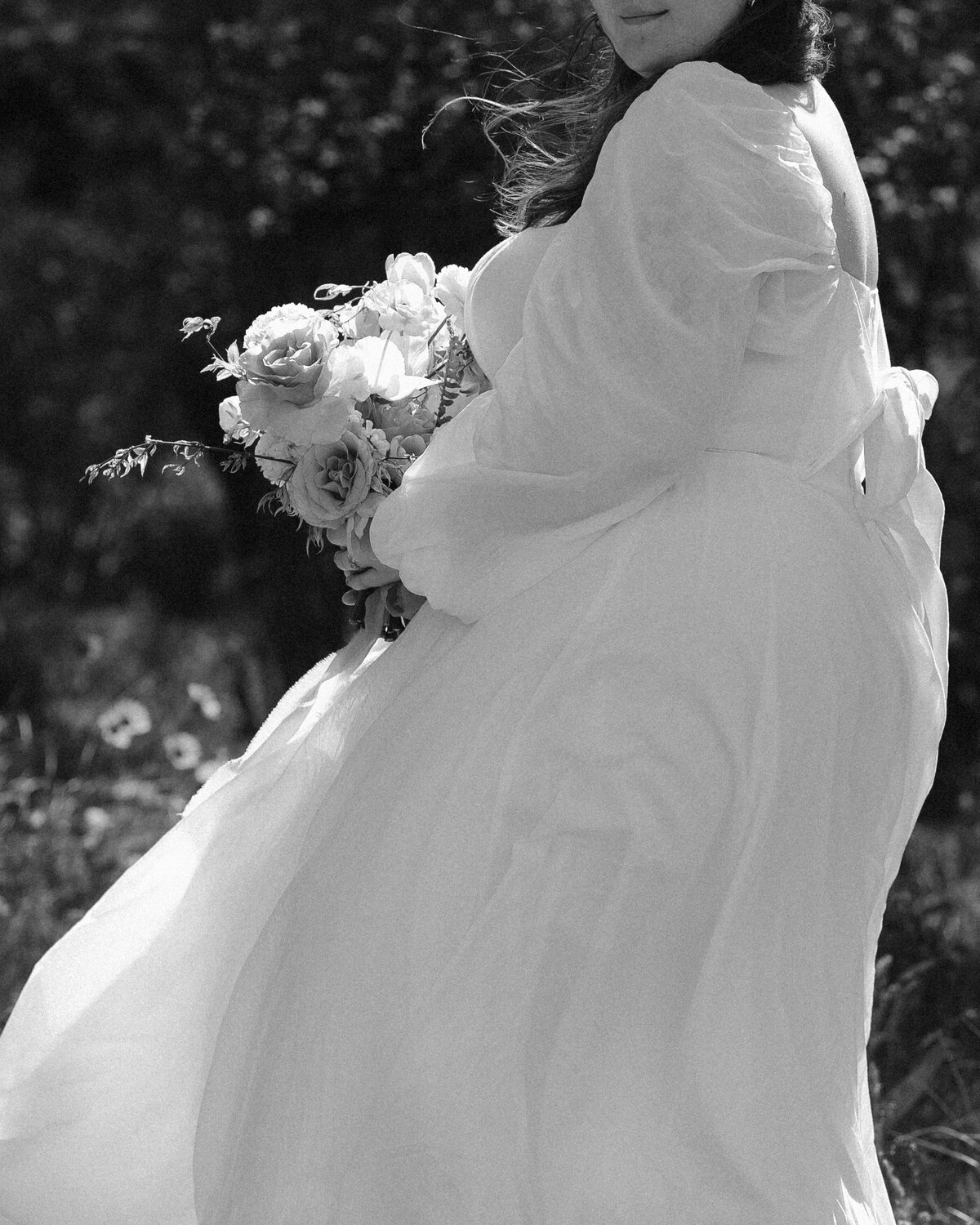 Chiffon wedding gown flowing in the wind