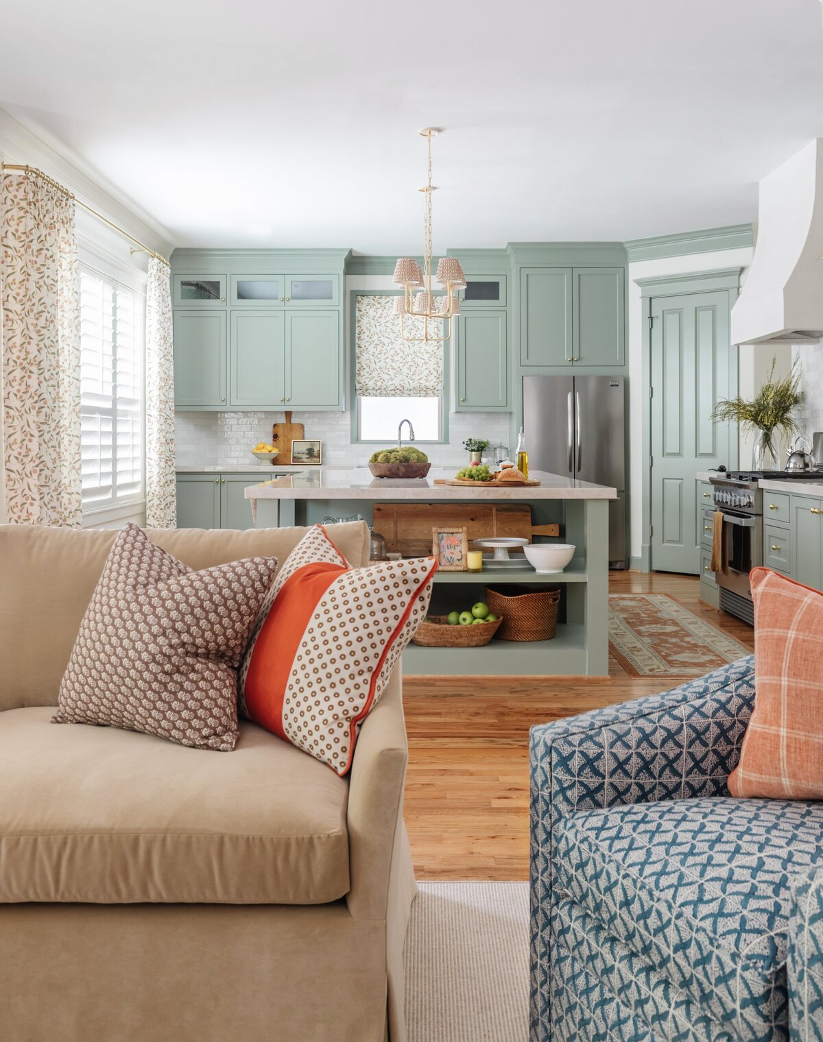 oyster creek studios oak forest remodel living room overlooking light sage kitchen