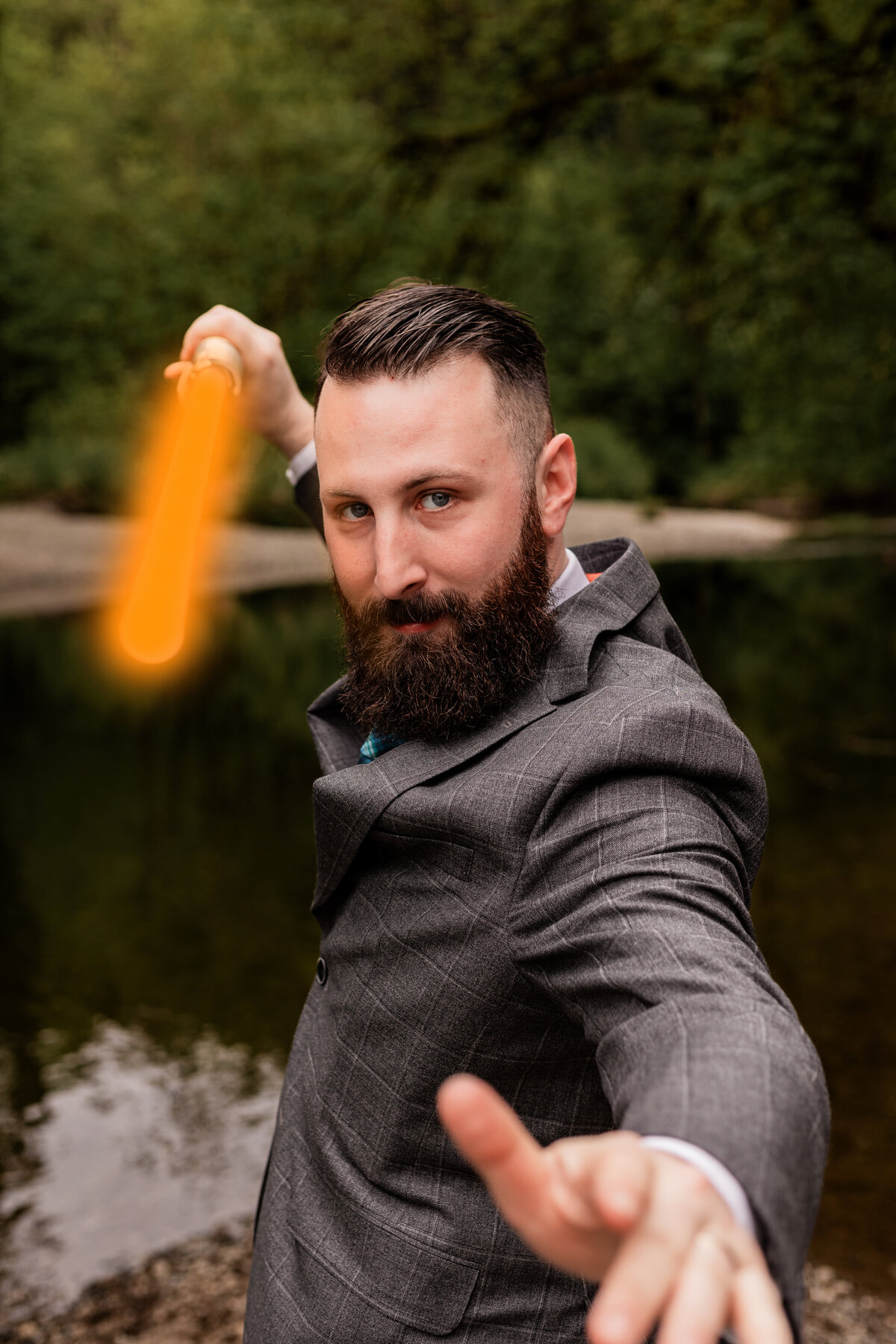 Groom poses with his lightsabre