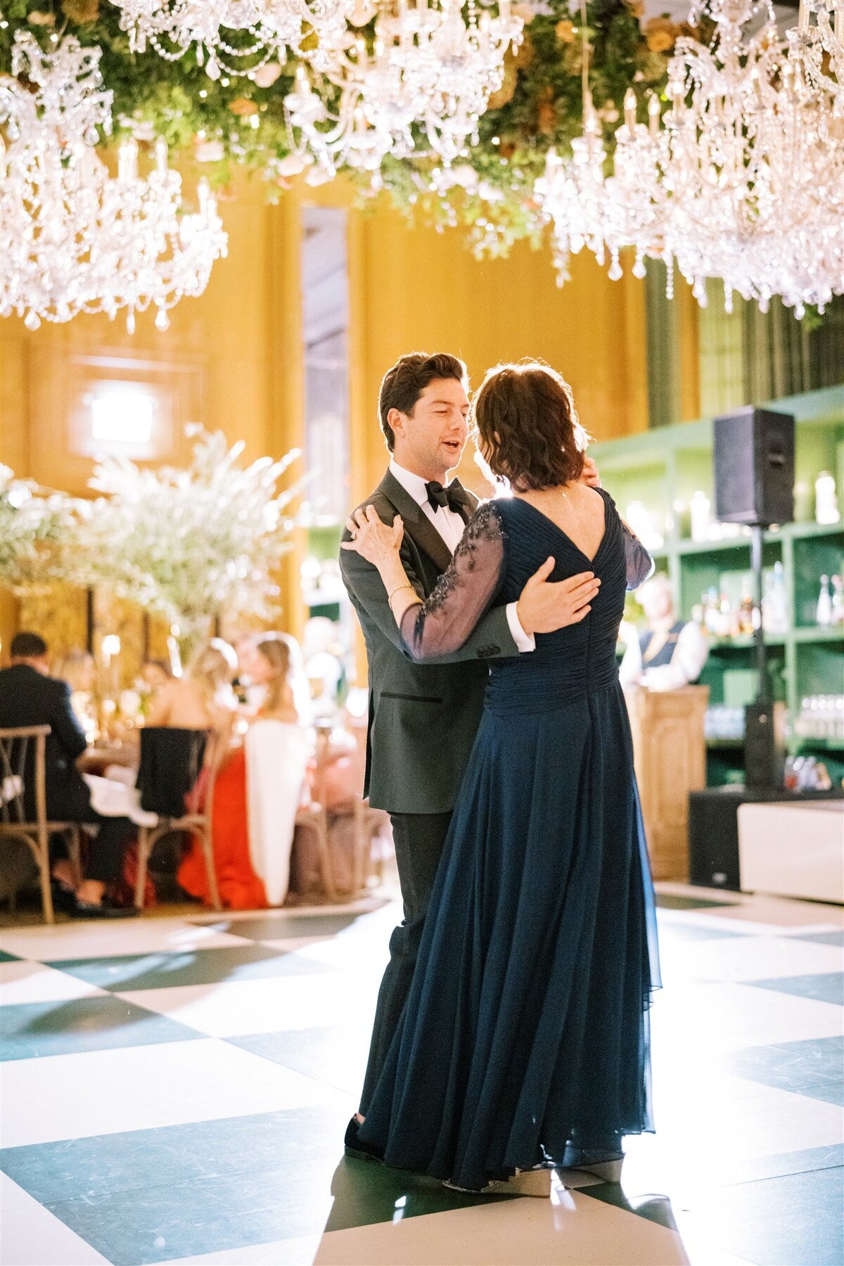 A picture of the groom dancing with his mother. 