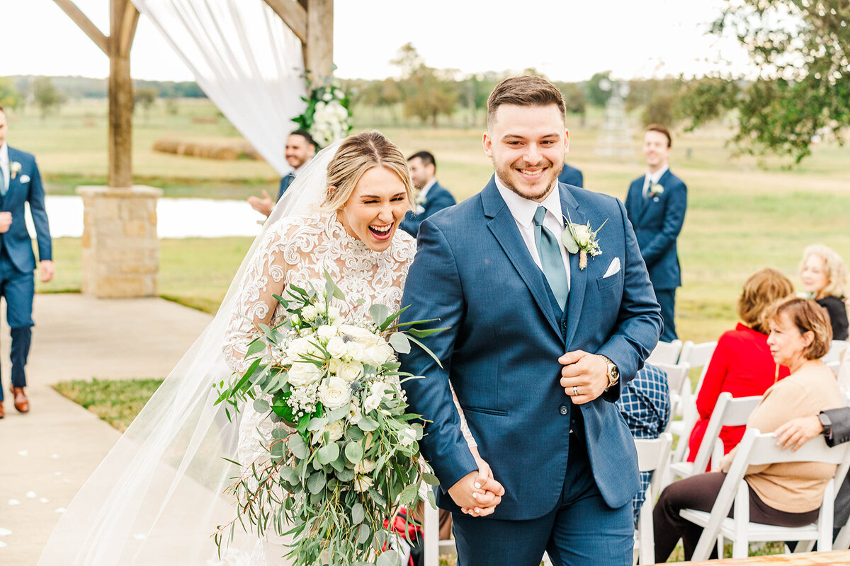 Couple Portrait using preferred vendor photographer at Emery's Buffalo Creek > A;ll Inclusive Houston Wedding Venue Ceremony Photo at Emery's Buffalo Creek