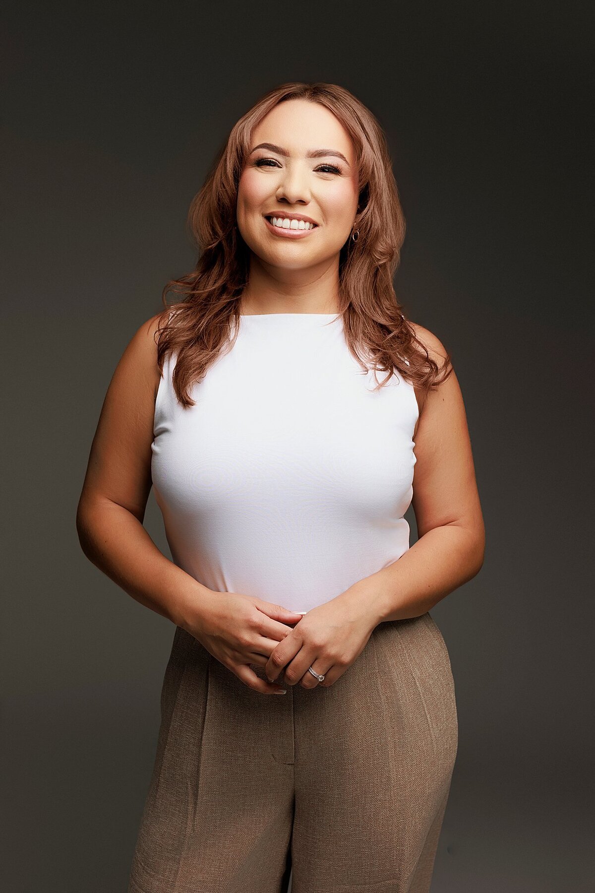 LinkedIn-ready headshot for woman in tech, styled and shot in Austin luxury studio