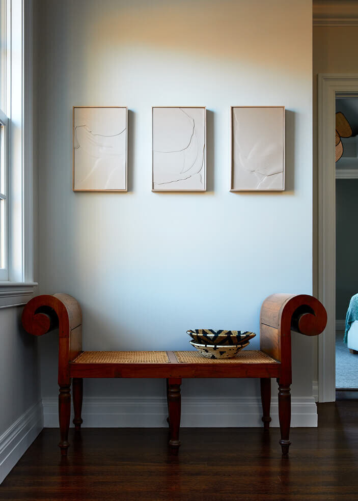 Interior decorator in Boston MA combines vintage furniture with modern art for unique, timeless spaces.