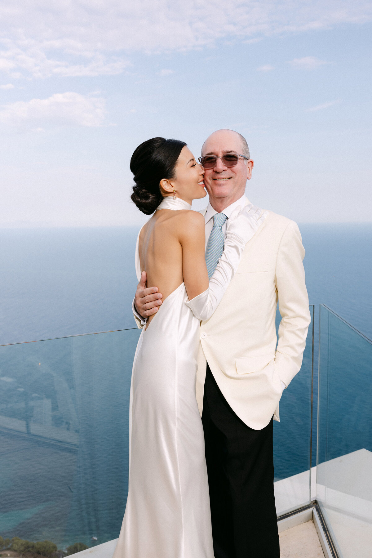 Elegant married couple posing in a lift of The Maybourne Riviera at Roquebrune-Cap-Martin, France