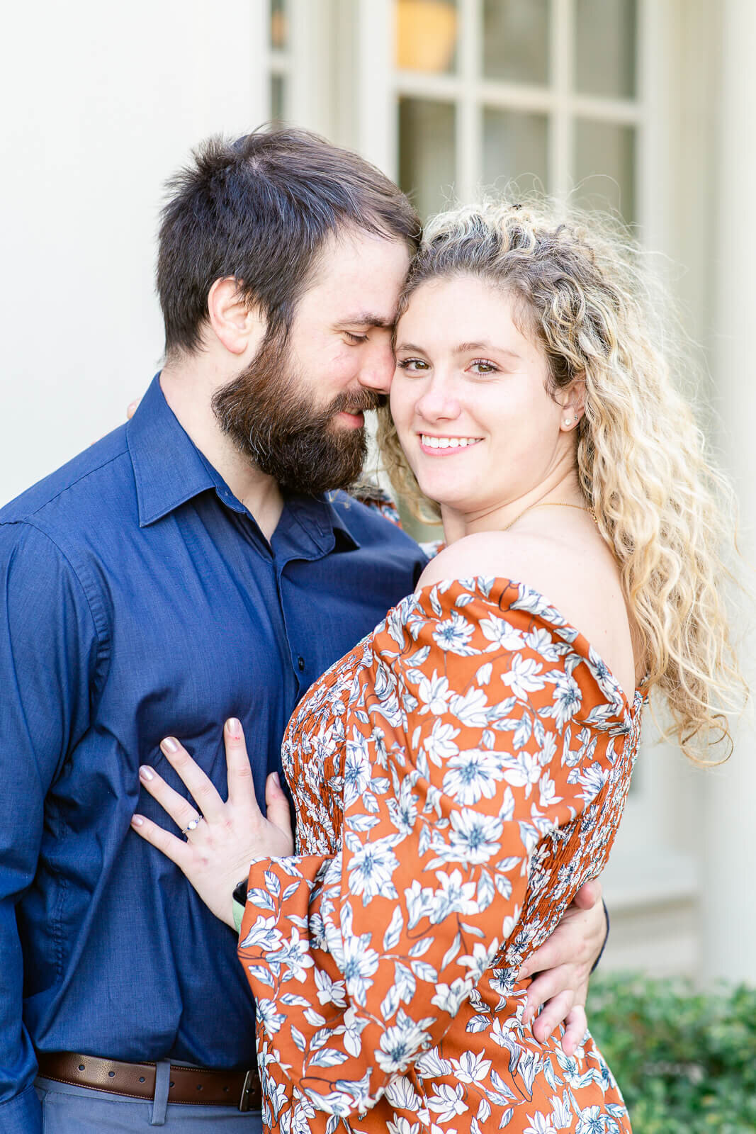 Engaged Couple taking portraits at the Virginia Museum of Fine Arts in Richmond, Virginia. Taken by Bethany Aubre Photography.