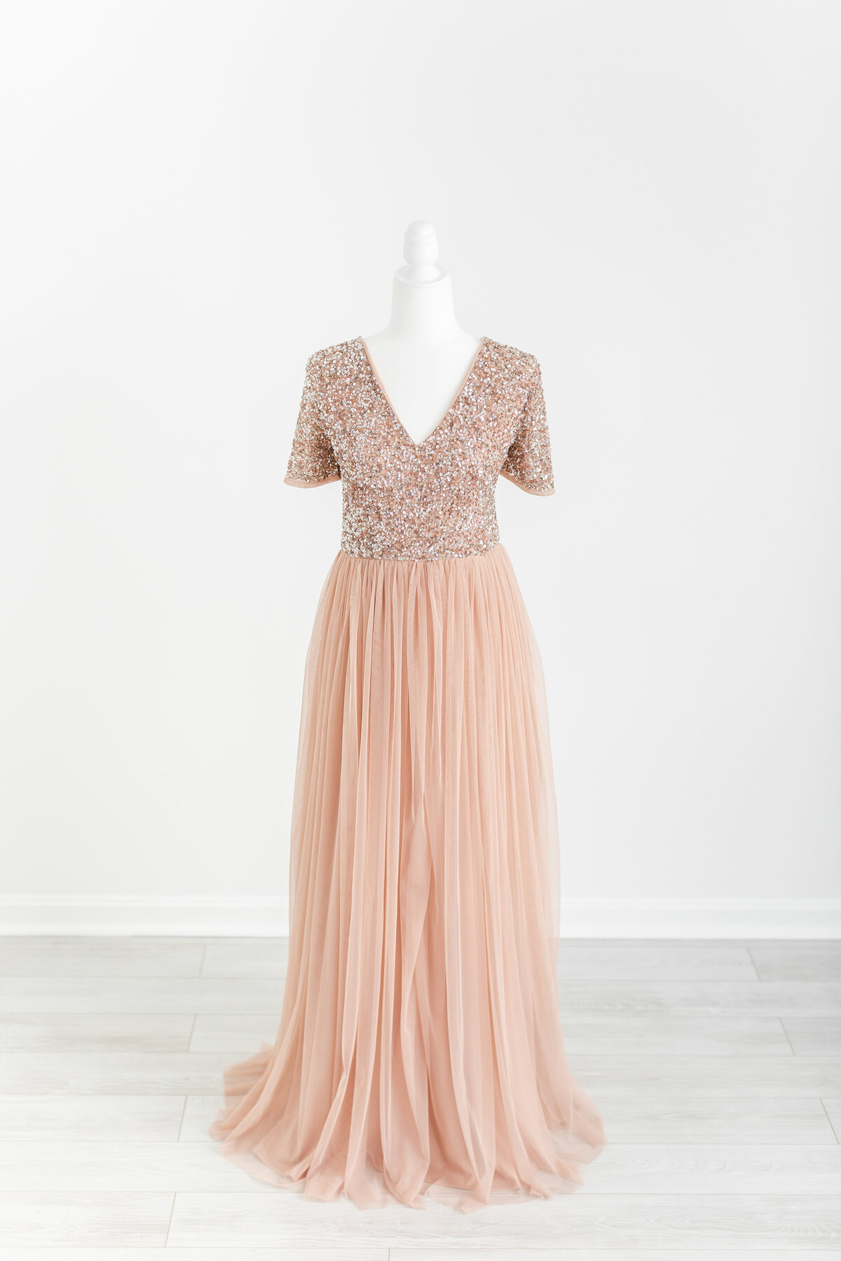 A flowy pink tulle dress with a sequin bodice by DC Newborn Photographer