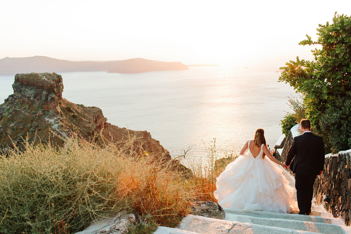 Utah Wedding Photographers capture bride and groom running off into sunset after wedding