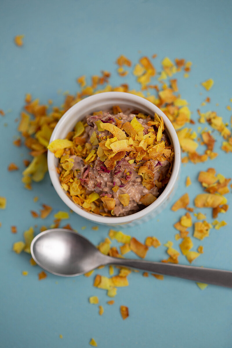Bowl of breakfast cereal with colorful toppings