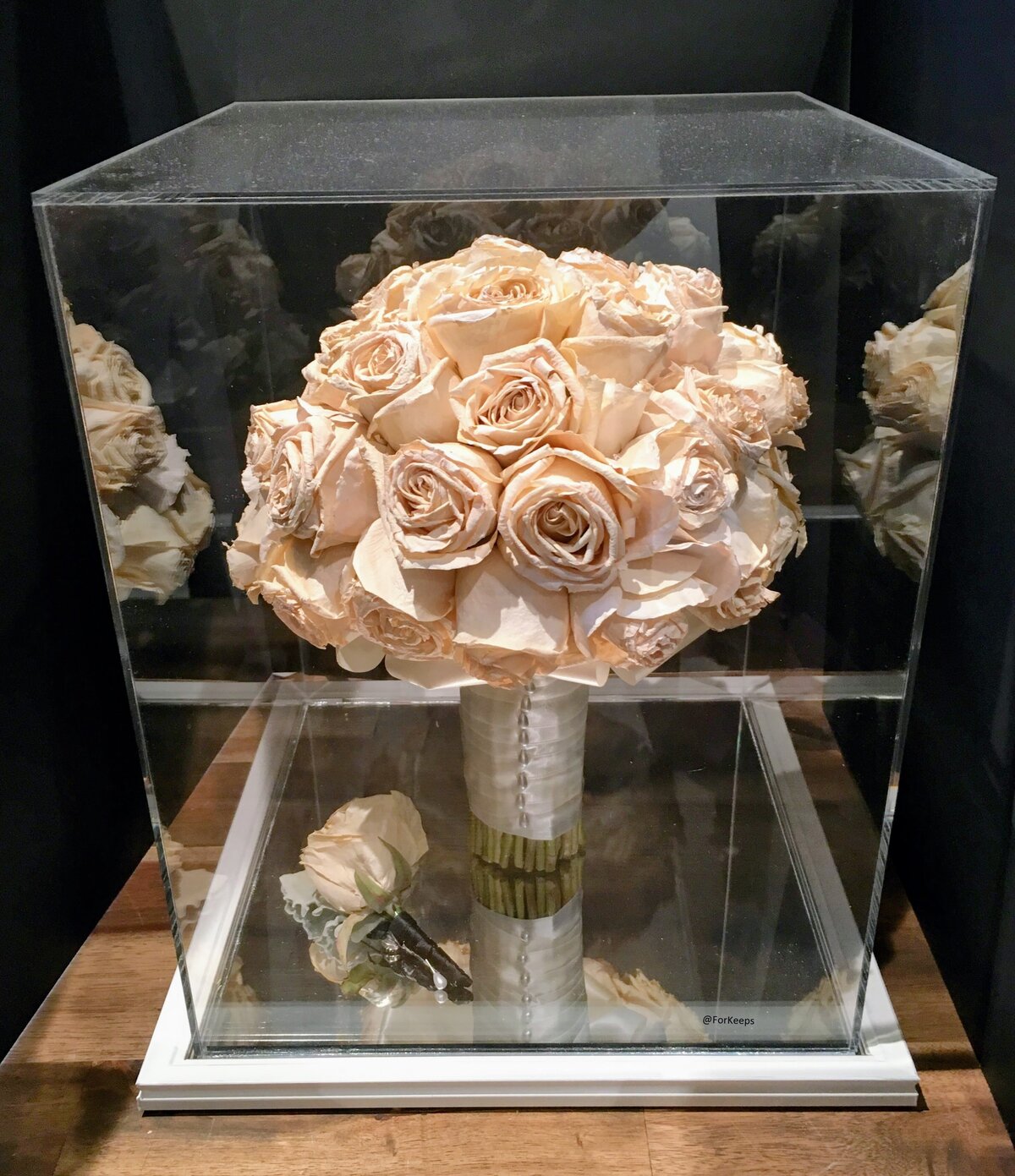Wedding bouquet preserved inside perspex keepsake.