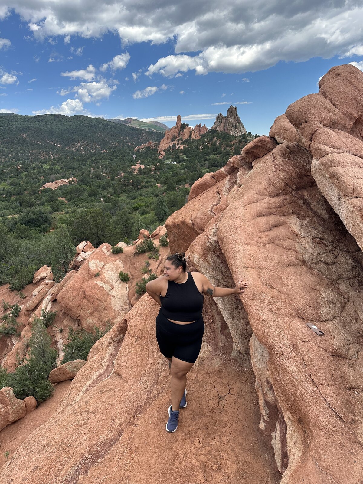 Ashley standing at the Garden of the Gods in Colorado.