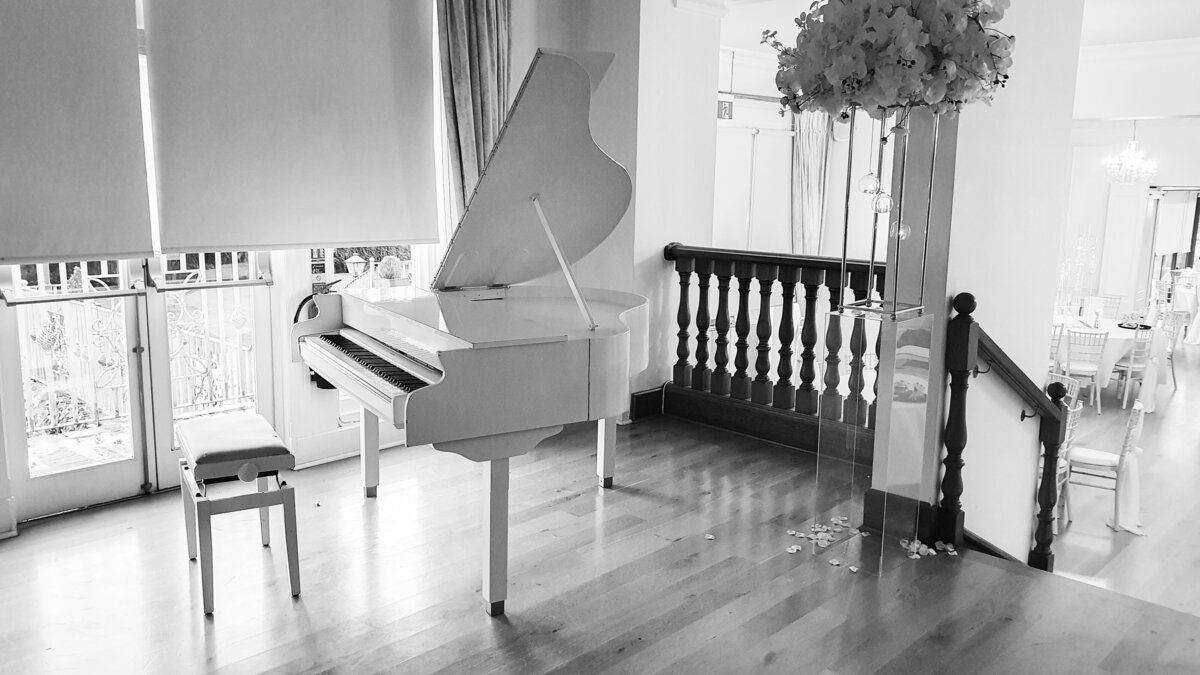 white baby grand piano for wedding