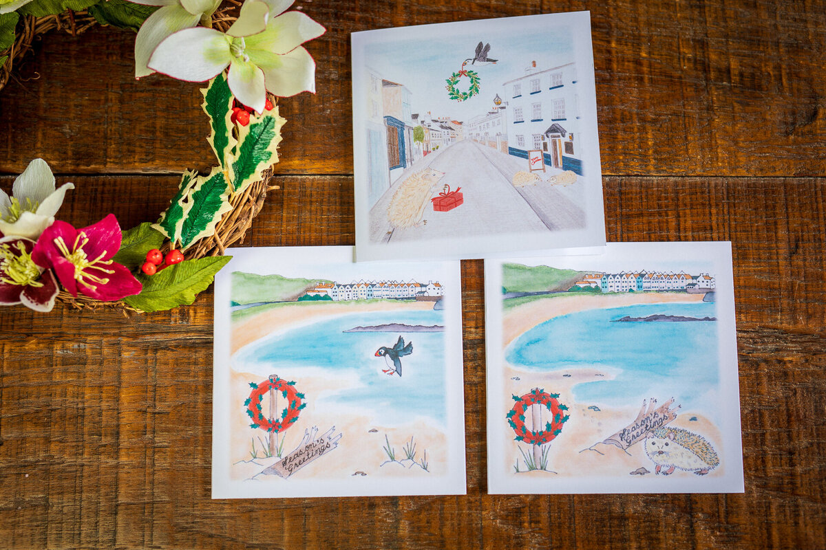 Christmas cards showing scenes of Alderney