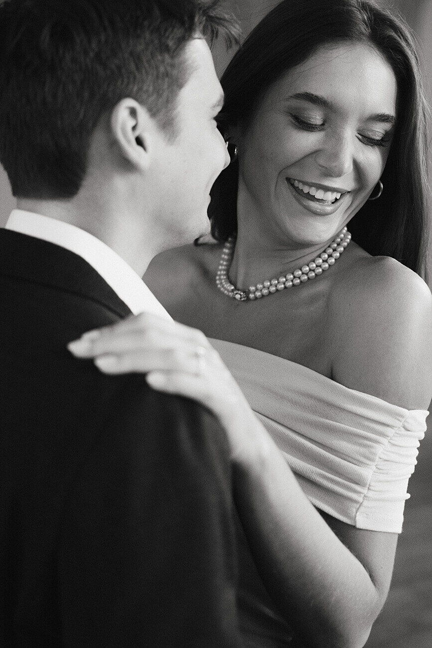 black and white photo of guy and girl hugging close up