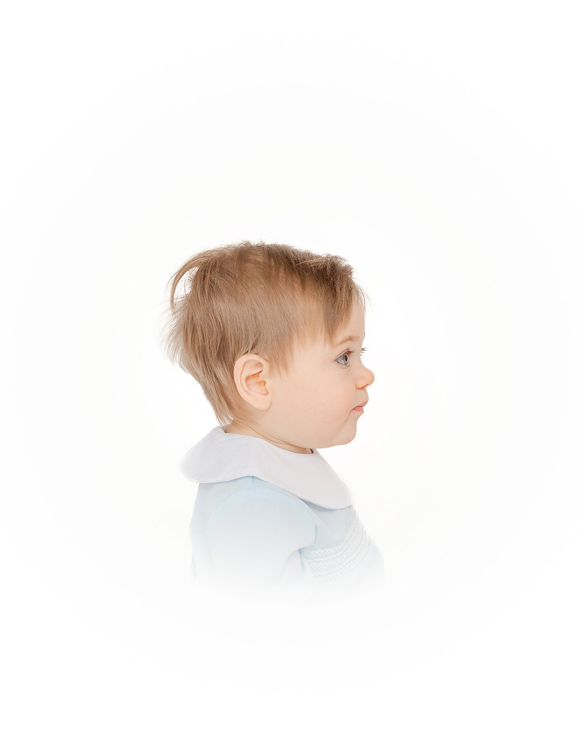 baby boy's right profile during heirloom photography in Fairfax, Virginia