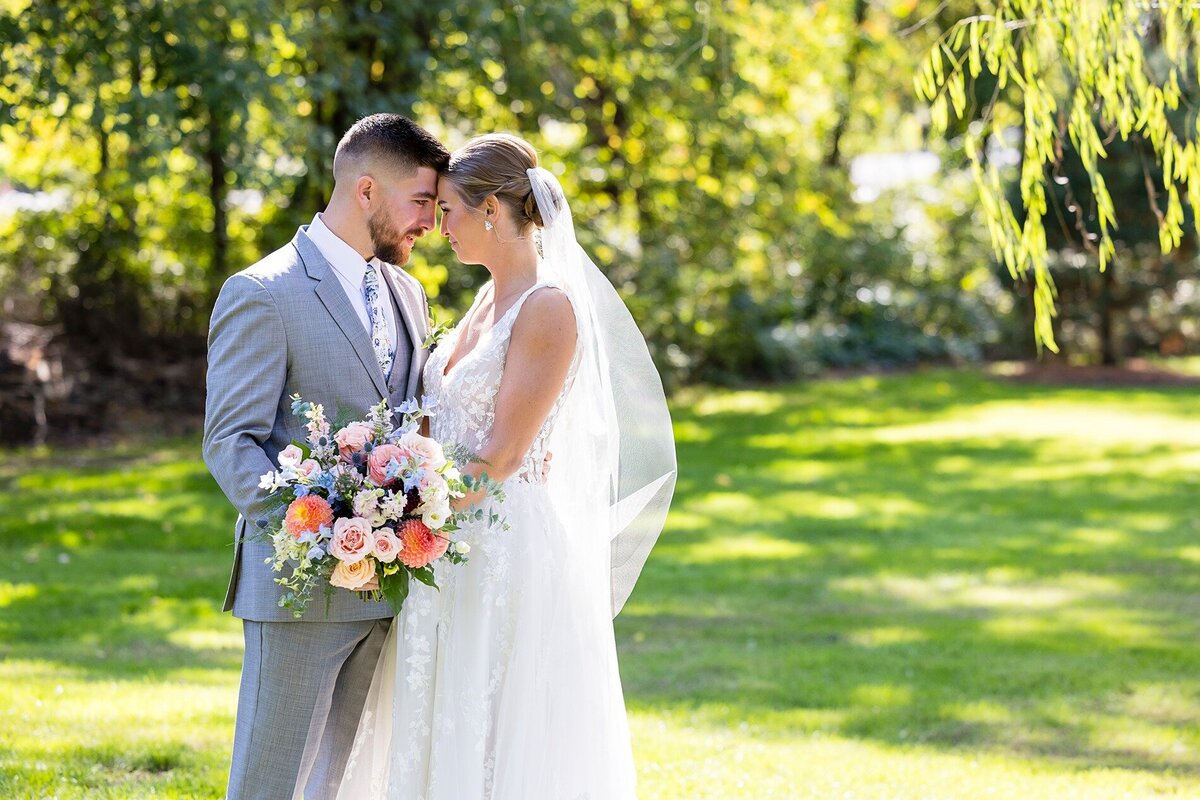 bride-and-groom-nose-to-nose-historic-acres