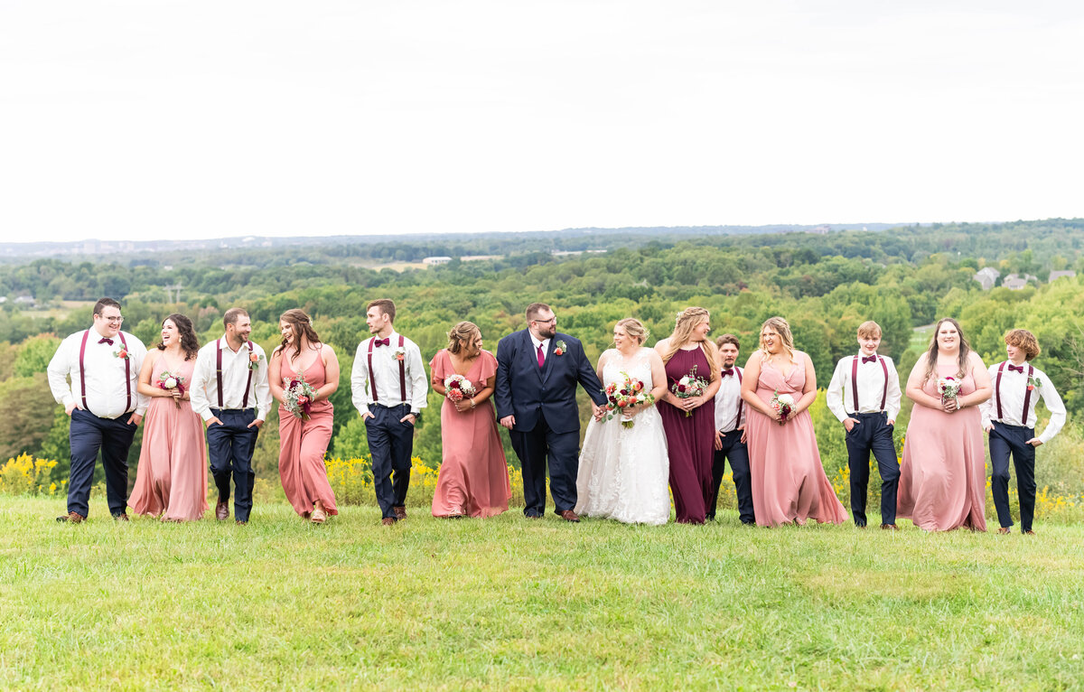large wedding party laughing