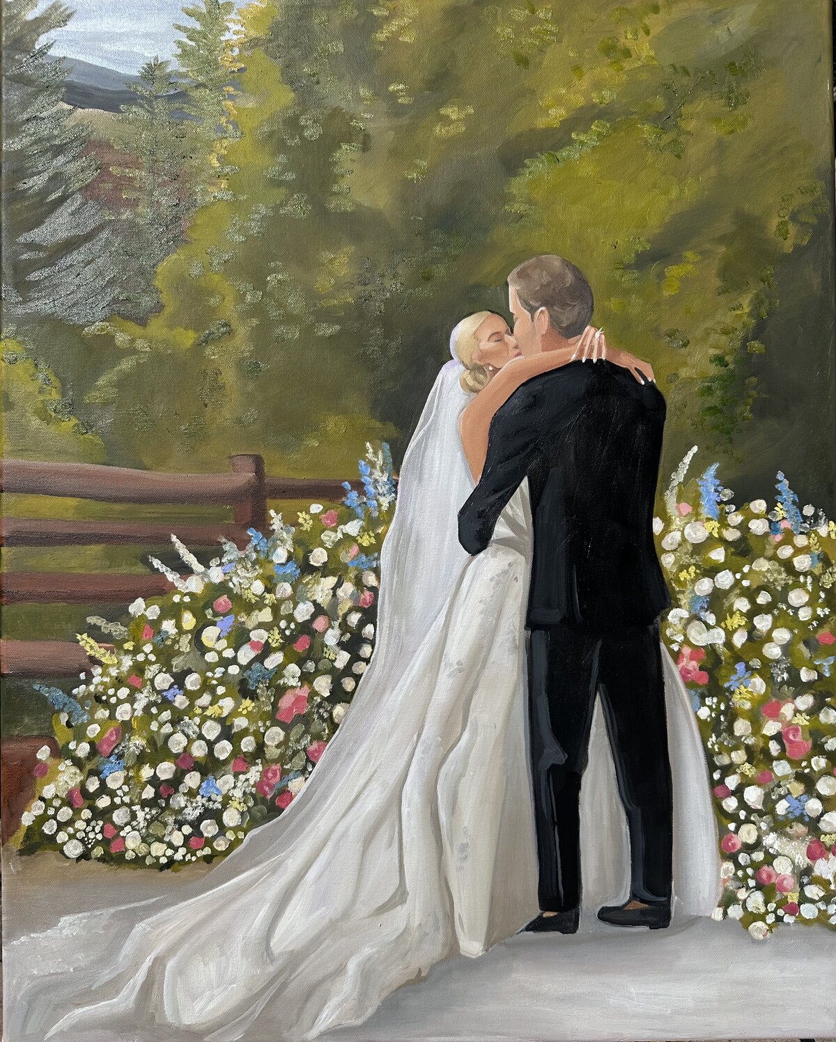 A live wedding painting of a couples first kiss at a luxury wedding in Beaver Creek, Colorado by artist Olivia Andruss Artistry.