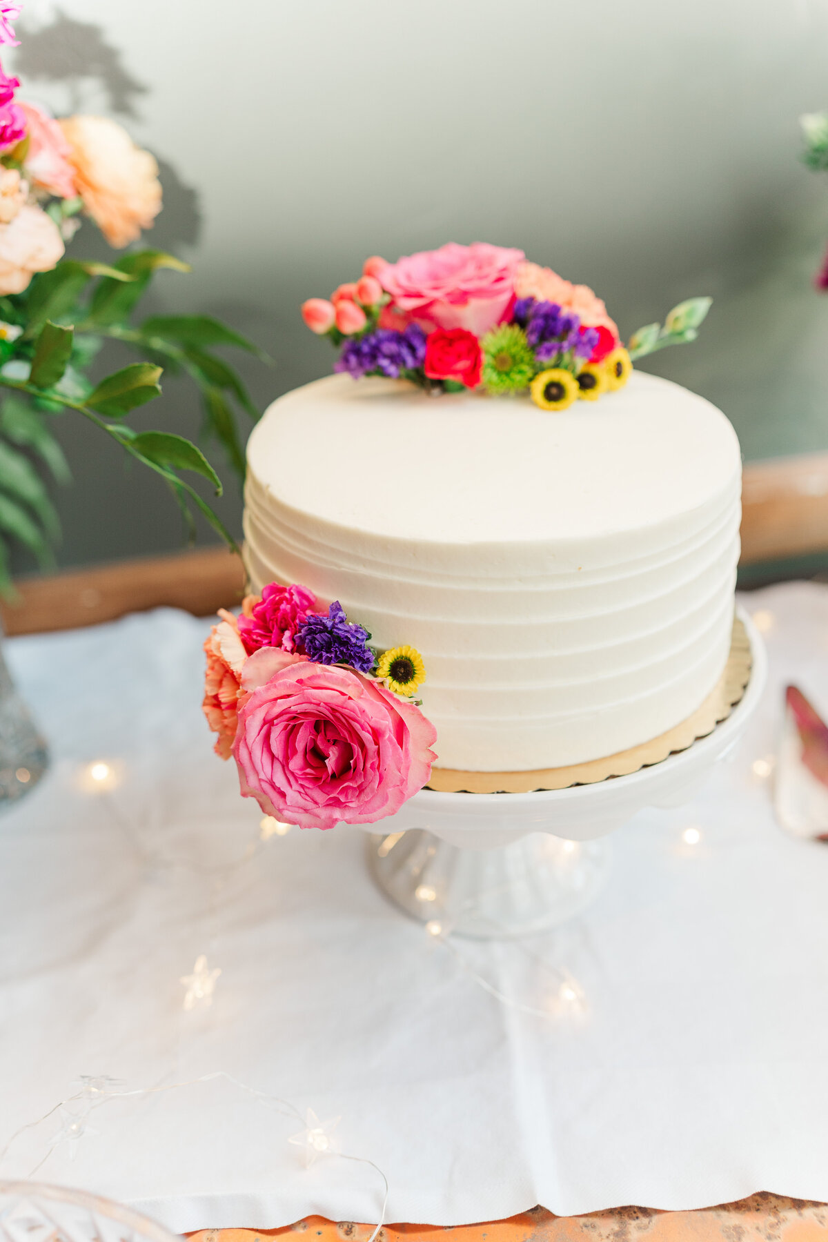 Lake Dillion Reservoir Colorado Elopement Wedding Mountain View Summer Pink and Orange Florals Sparkly Dress Light and Airy Elena Spraguer Photography0021