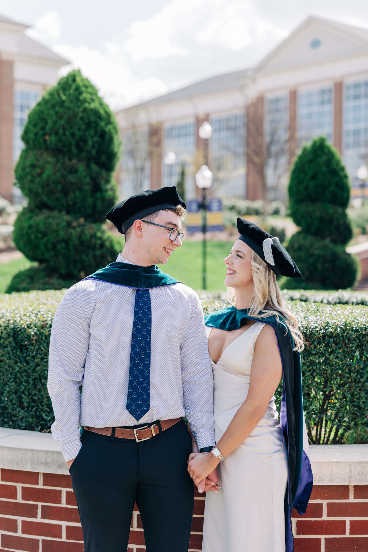 College-grads-looking-at-each-other-High-Point-University