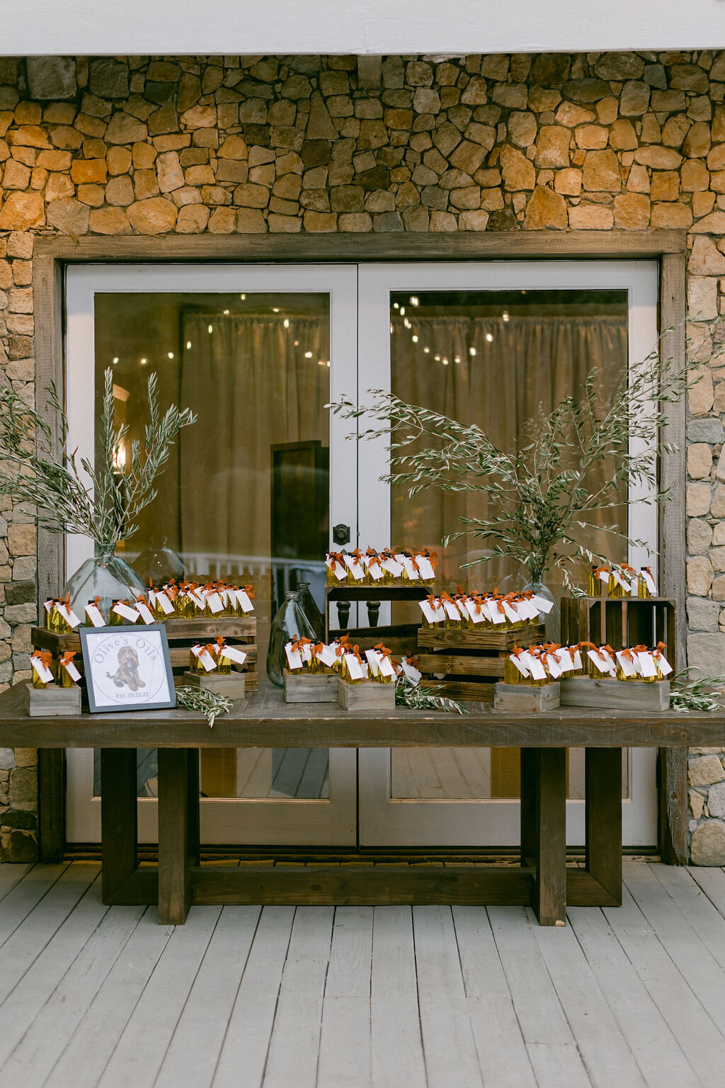 olive branch and olive oil bottles