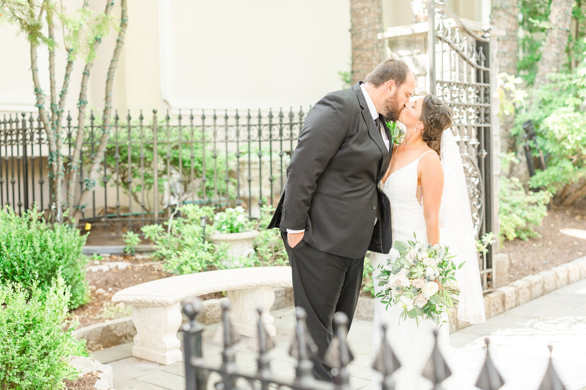 Bride and groom first kiss in Traverse City Michigan