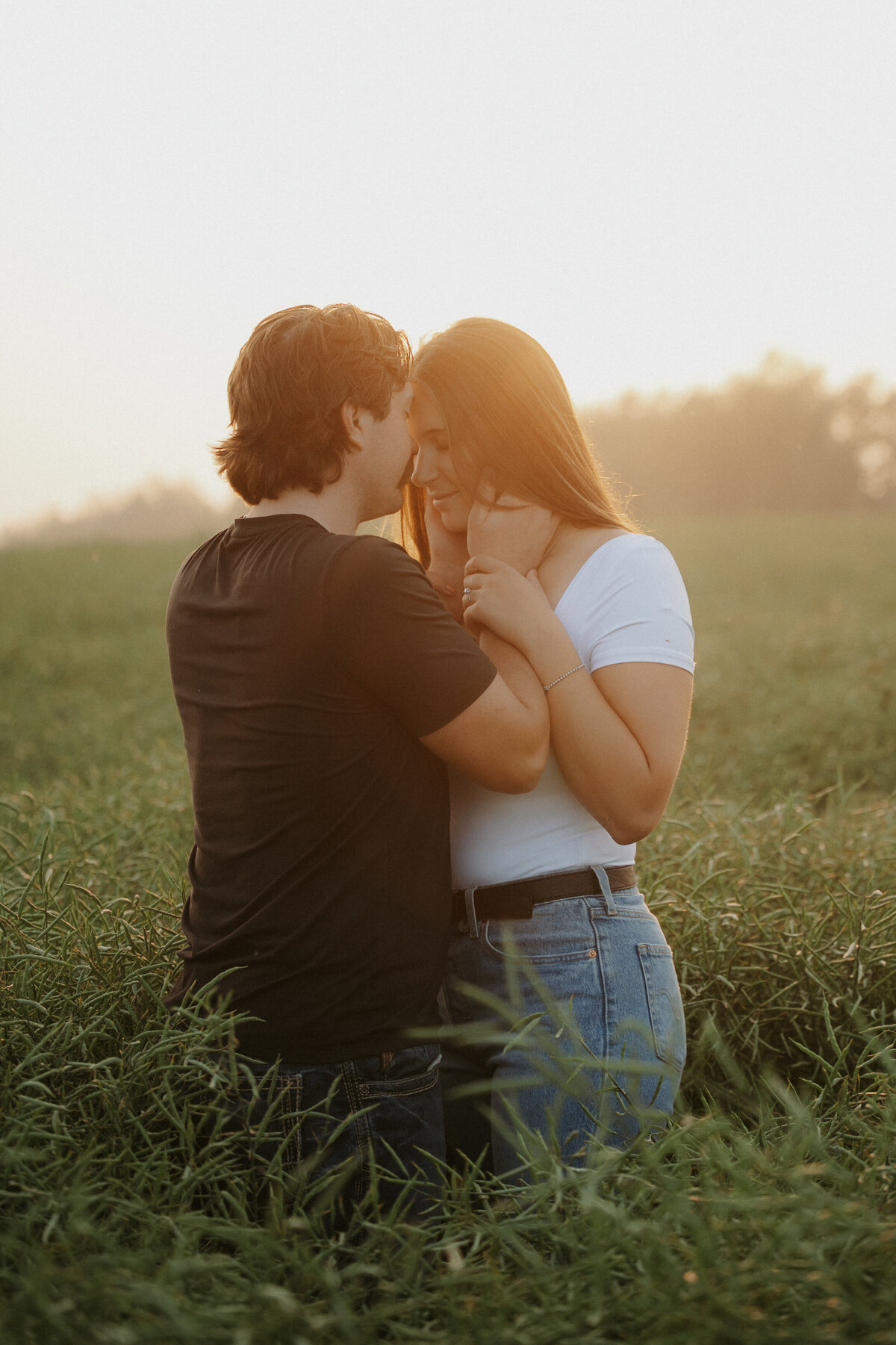 Outdoor farmers field engagement couples session in Alberta