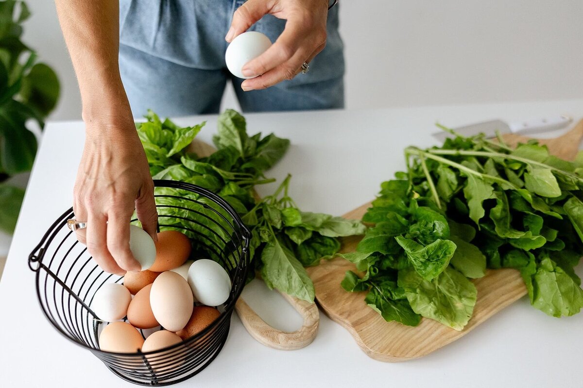 Functional Wellness Coach preparing healthy food