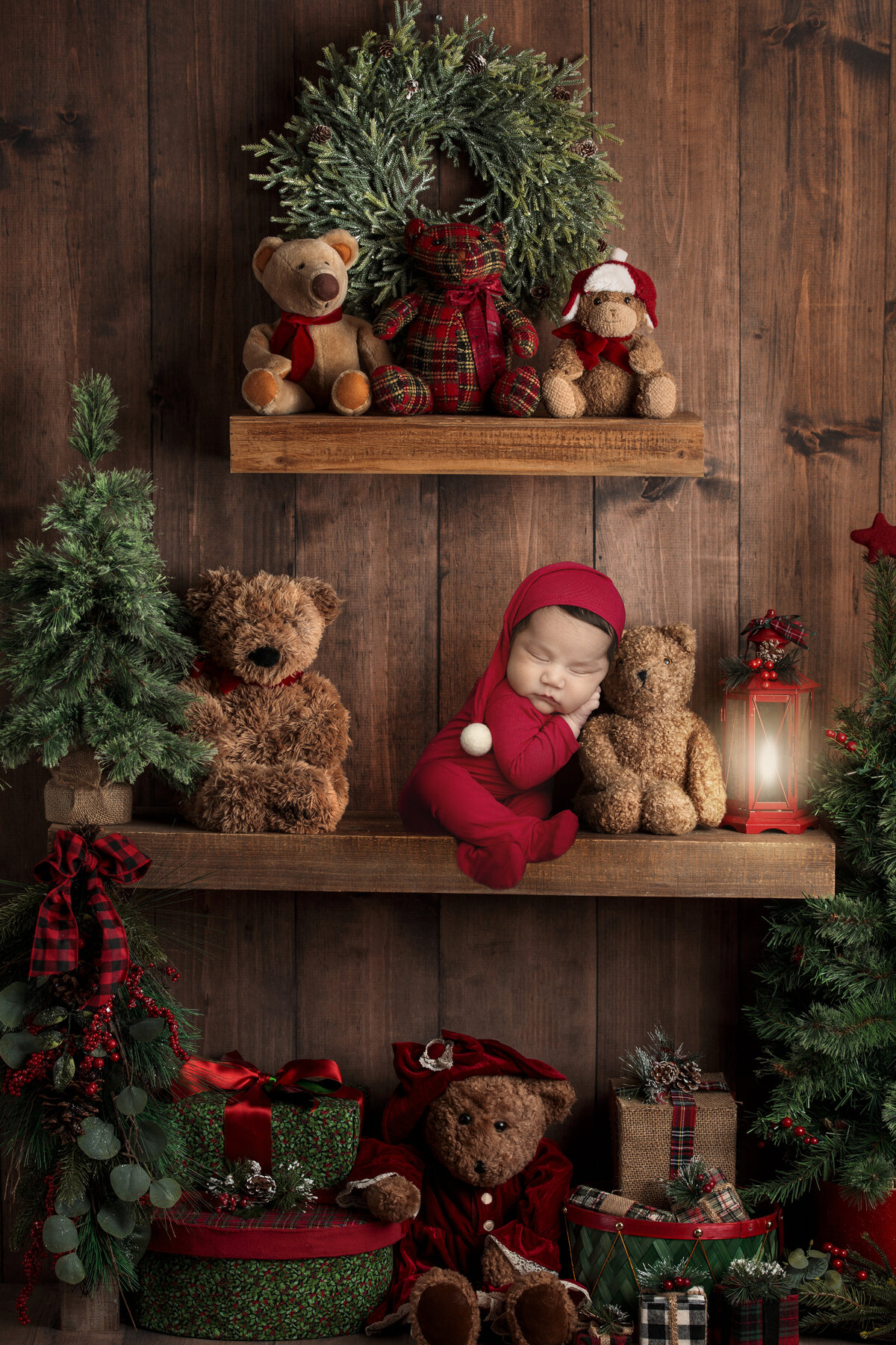 newborn boy as christmas elf with bears