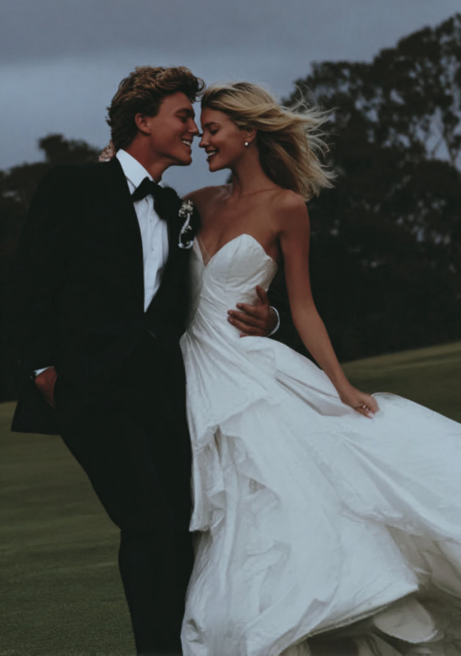 u8487914977_a_happy_blonde_bride_in_a_white_dress_and_a_groom_389205c0-1616-4f41-aa5b-738e37d5c0bc_1