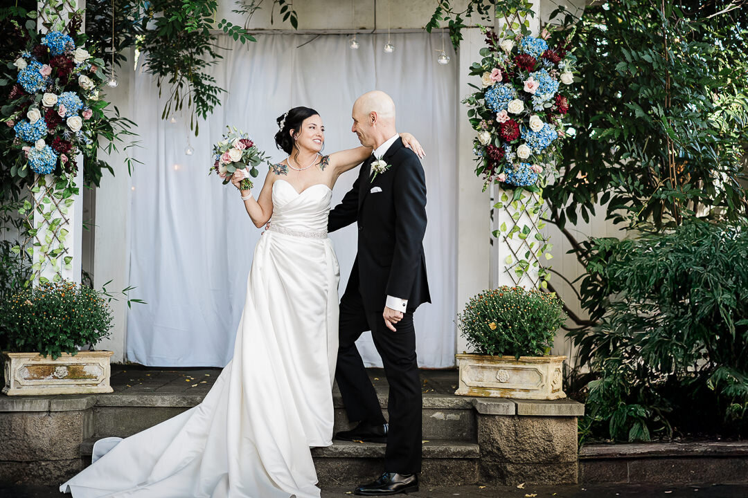 wedding-photo-floral-arch-bride-groom-moment-by-alex-kaplan-photography