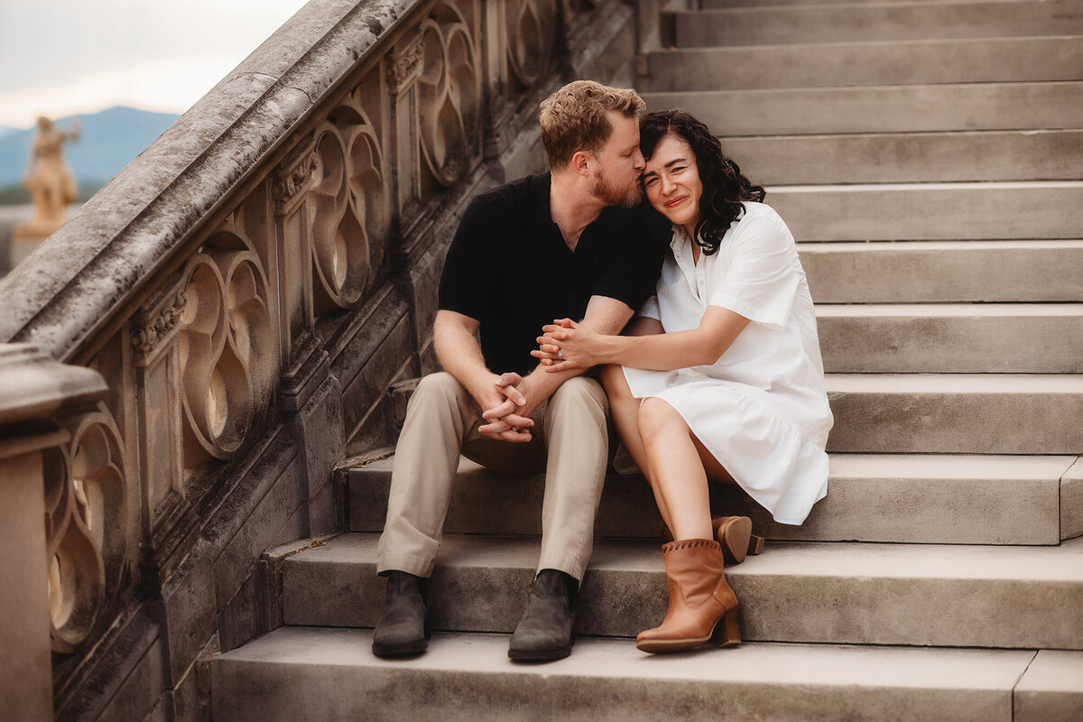 Couple embraces each other during Family Photoshoot in Asheville, NC. 