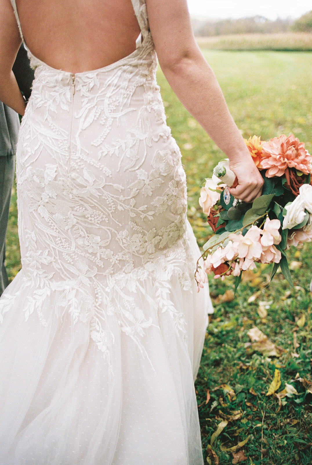 film picture of bridal gown and bride bouquet at Wolf Oak Acres