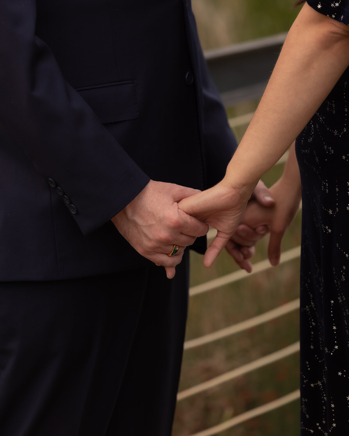 Central Coast Cypress Ridge Pavilion Wedding candid couples sunset photos holding hands on dock with pond