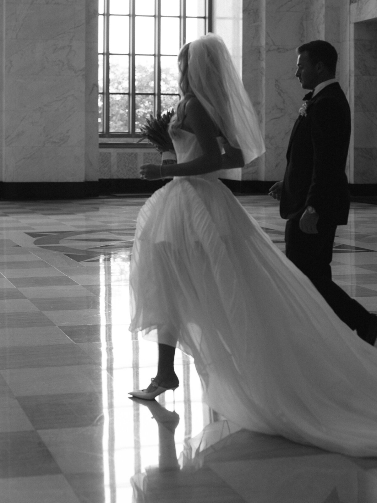 Sophisticated editorial wedding photography at NOBU Hotel Chicago featuring Lauren Alatriste's fashion forward approach, creating luxury wedding imagery that balances magazine-worthy editorial excellence with authentic bridal preparation moments.