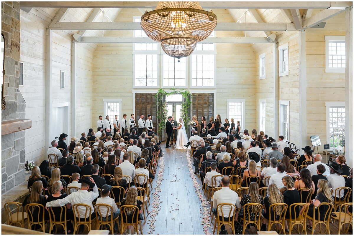 Couple getting married on the main floor of Walker Farms