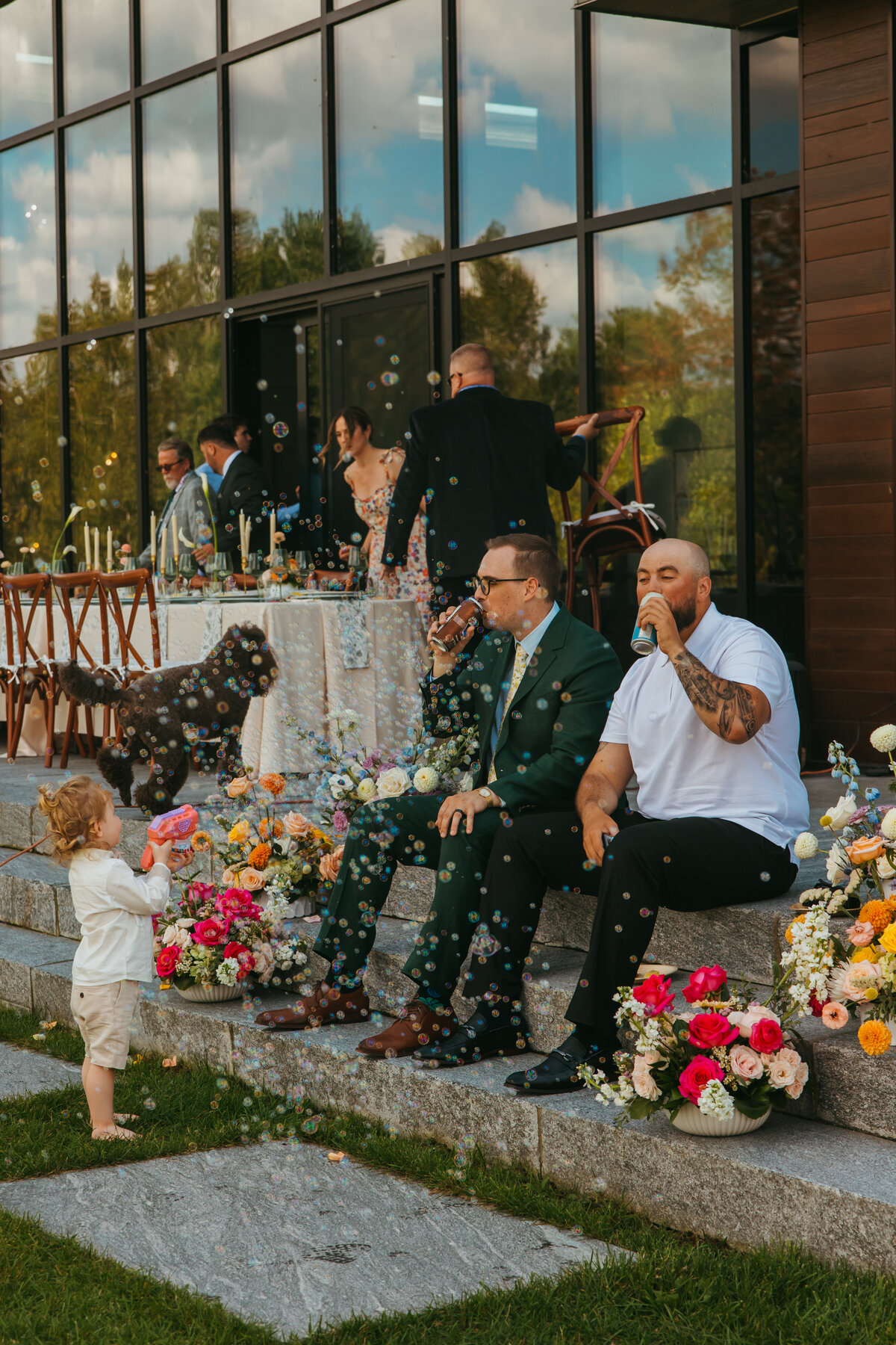 ring bearer plays with bubbles