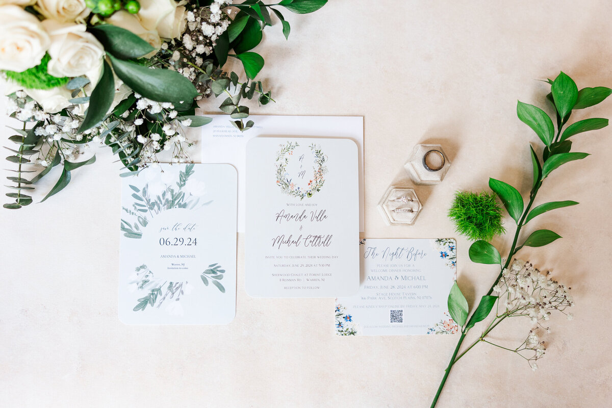 Flat lay of an elegant wedding invitation from a Warren, New Jersey celebration, highlighting refined typography and design details." Title Attribute: "Warren NJ Wedding Invitation Detail