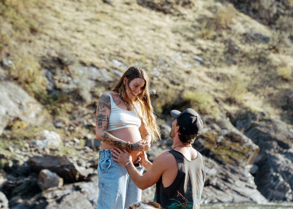 Couple during golden hour engagement and maternity shoot in Riggins, Idaho wedding/elopement - photographed by The Storytellers
